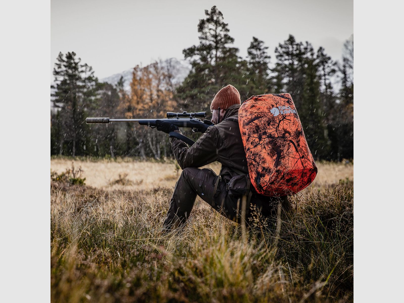 Spodnie myśliwskie FJÄLLRÄVEN Barents Pro M Zielony Kamuflaż / Głęboki Las