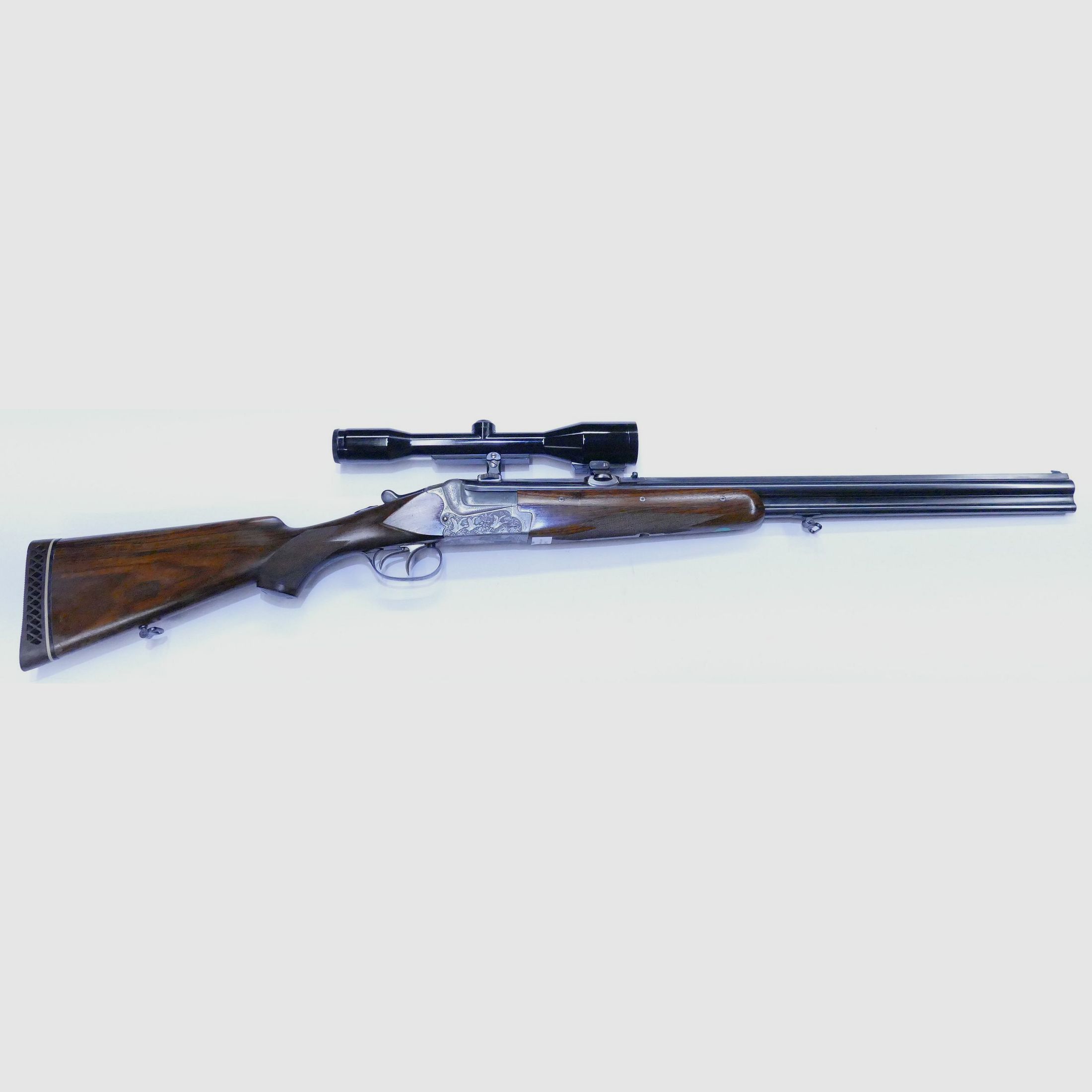 Merkel 211 12/70 7x65R over-and-under rifle