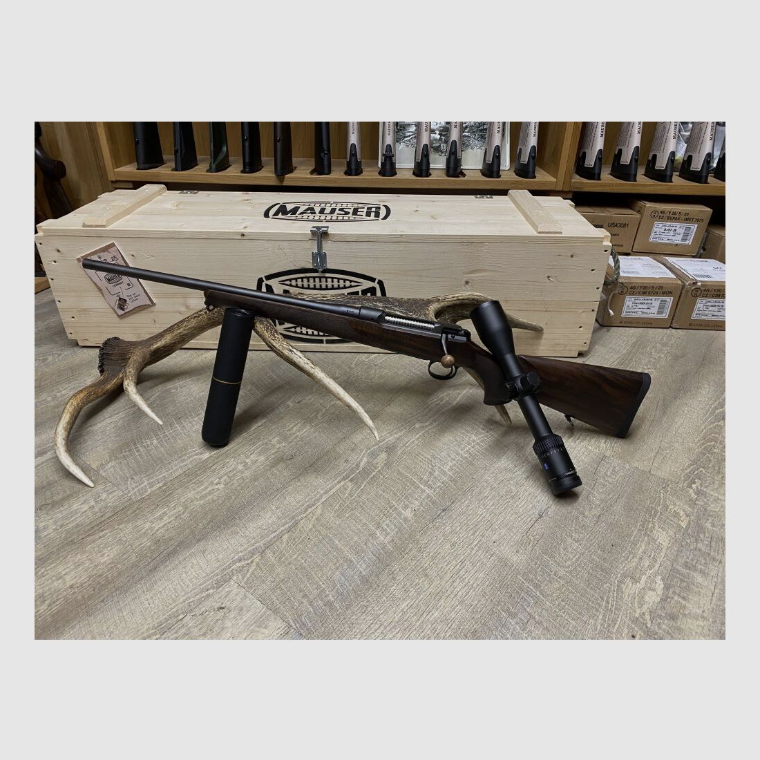 Sauer 101 Artemis, left, with Zeiss Conquest V6 2-12x50 M, with rail