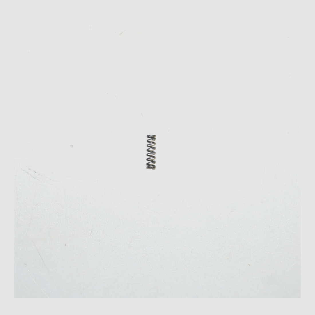 Usine d'armement de Berne Ressort de verrouillage usagé pour pistolet d'ordonnance suisse Parabellum 1900, cal. 7,65mmPara, W+F P08