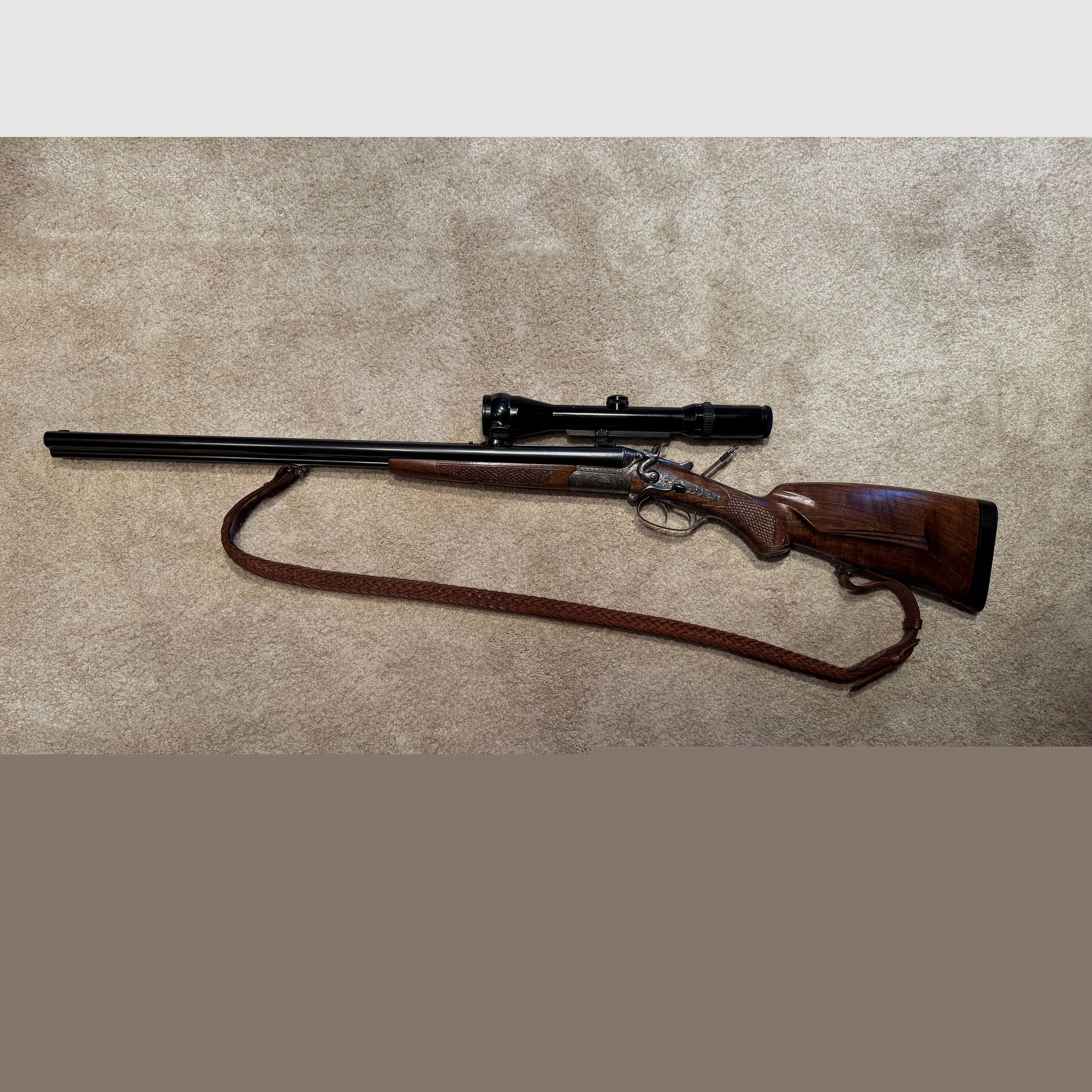 Sauer & Sohn Hahndrilling mit Seitenöffnung und kurzem Einstecklauf  |  KAL .30-30Win  |  16/70 |  .22 Magn. LFB