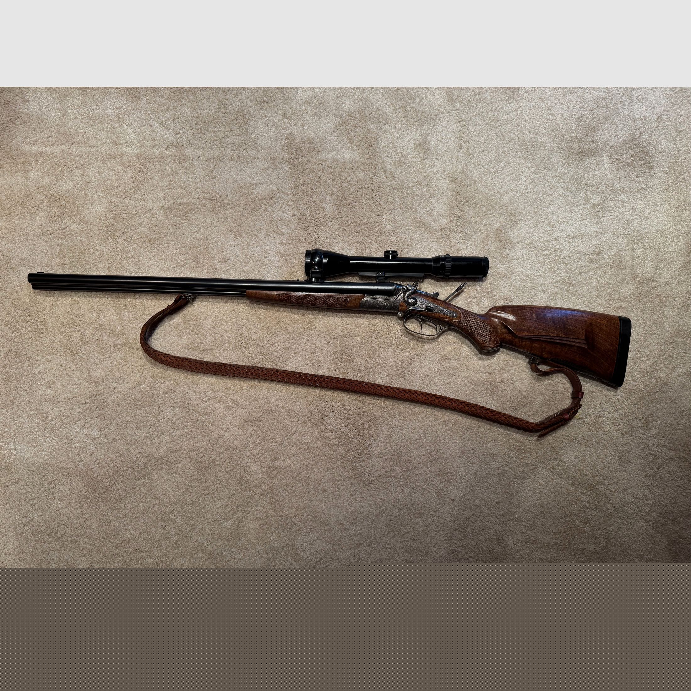 Sauer & Sohn Hahndrilling mit Seitenöffnung und kurzem Einstecklauf  |  KAL .30-30Win  |  16/70 |  .22 Magn. LFB