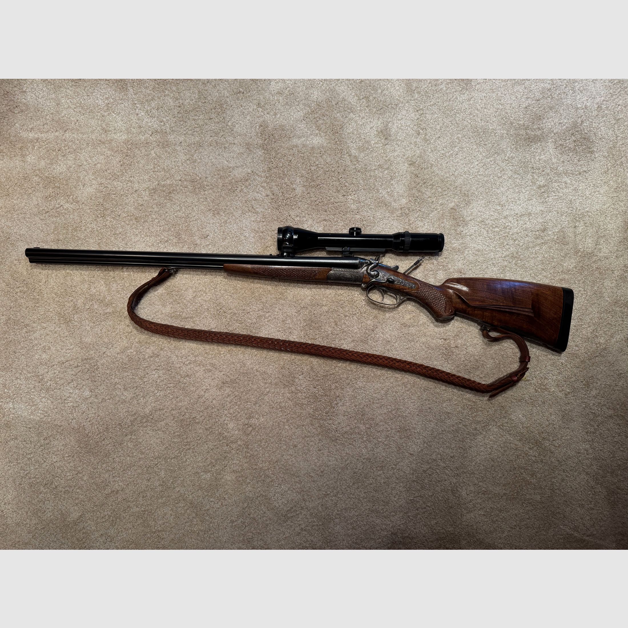 Sauer & Sohn Hahndrilling mit Seitenöffnung und kurzem Einstecklauf  |  KAL .30-30Win  |  16/70 |  .22 Magn. LFB