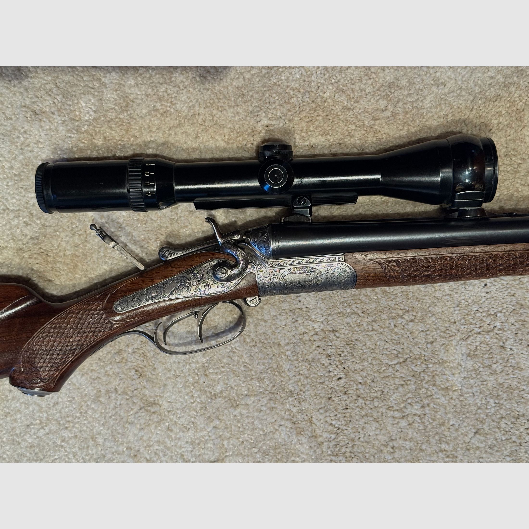 Sauer & Sohn Hahndrilling mit Seitenöffnung und kurzem Einstecklauf  |  KAL .30-30Win  |  16/70 |  .22 Magn. LFB