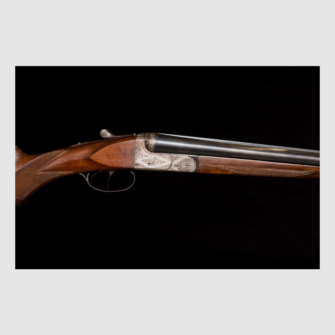 elegante Doppelflinte mit umfassender Gravur