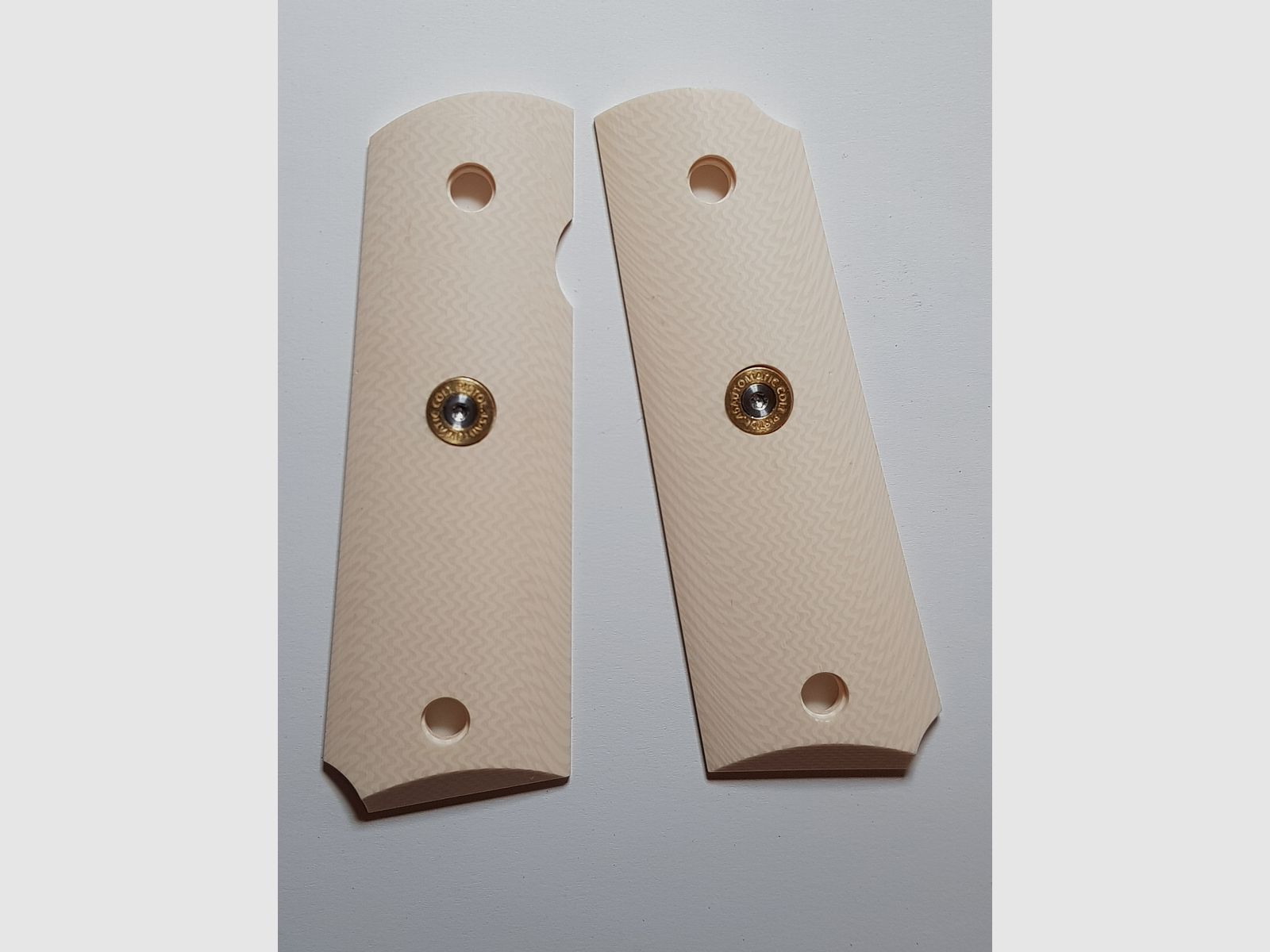 Grips of the Colt 1911 P.A.K