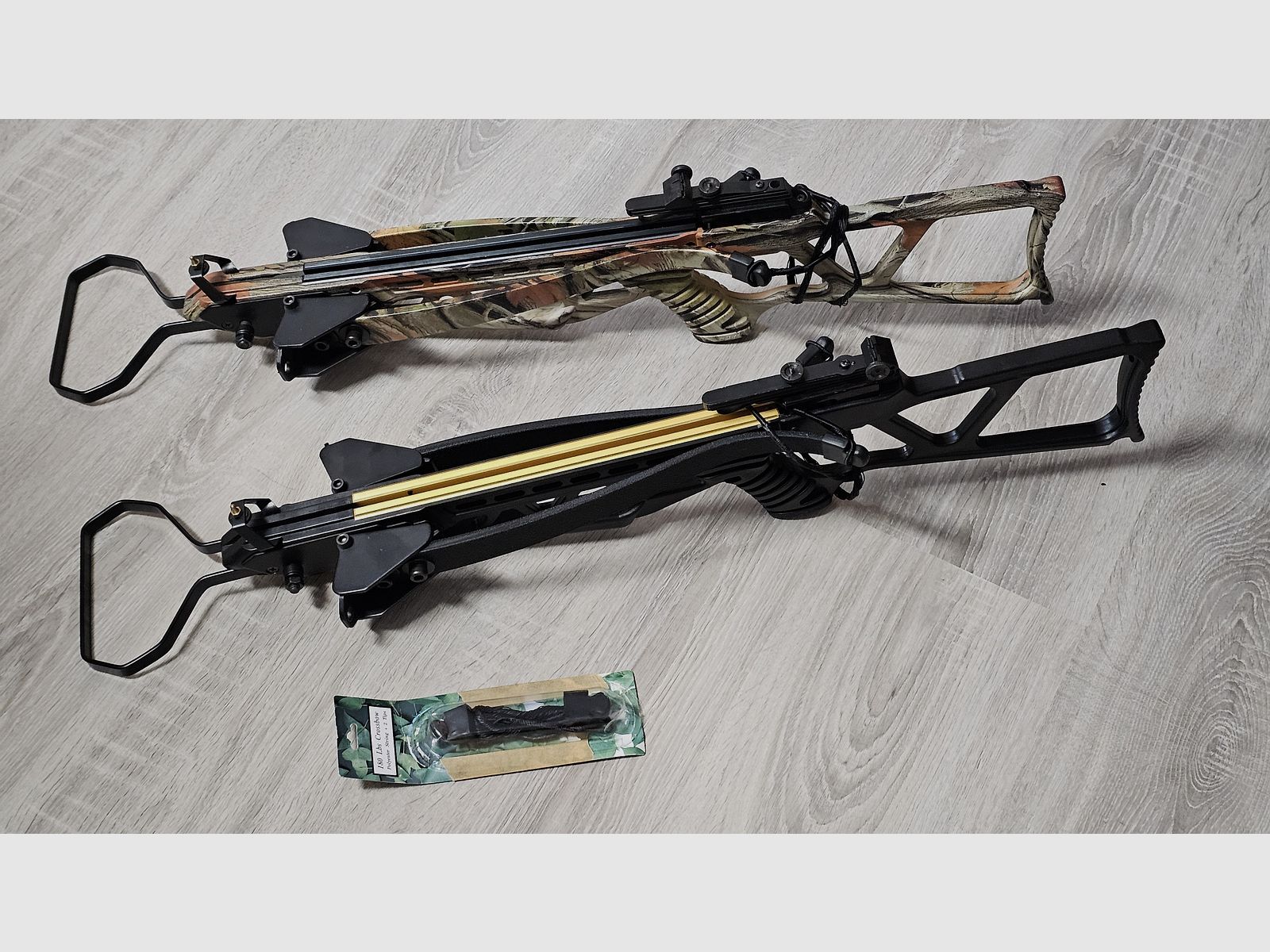 Recurve crossbow double set: 2x Skeleton Hunter 120 lbs (Camo & Black) foldable, 45 bolts, spare string