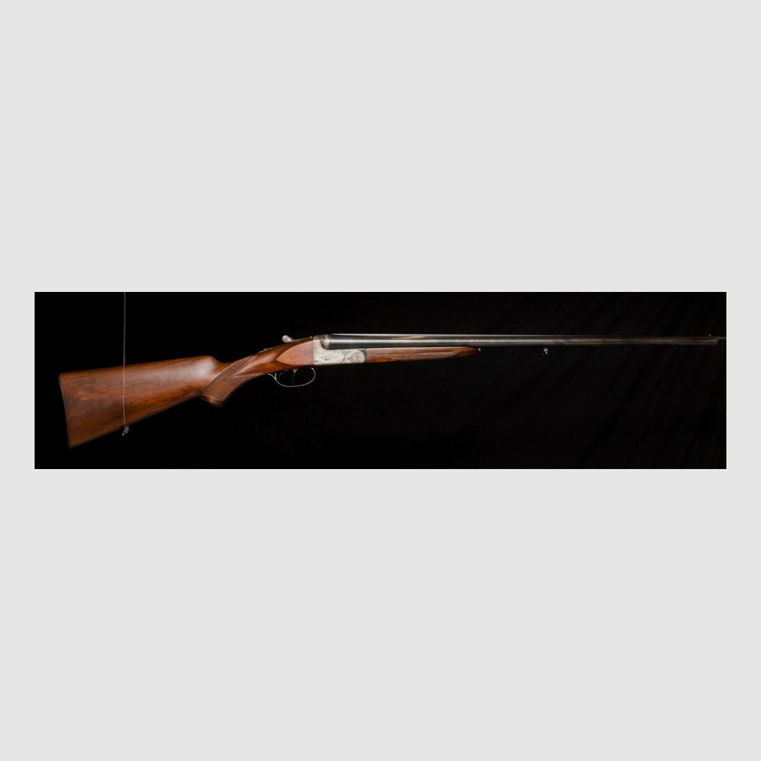 elegante Doppelflinte mit umfassender Gravur