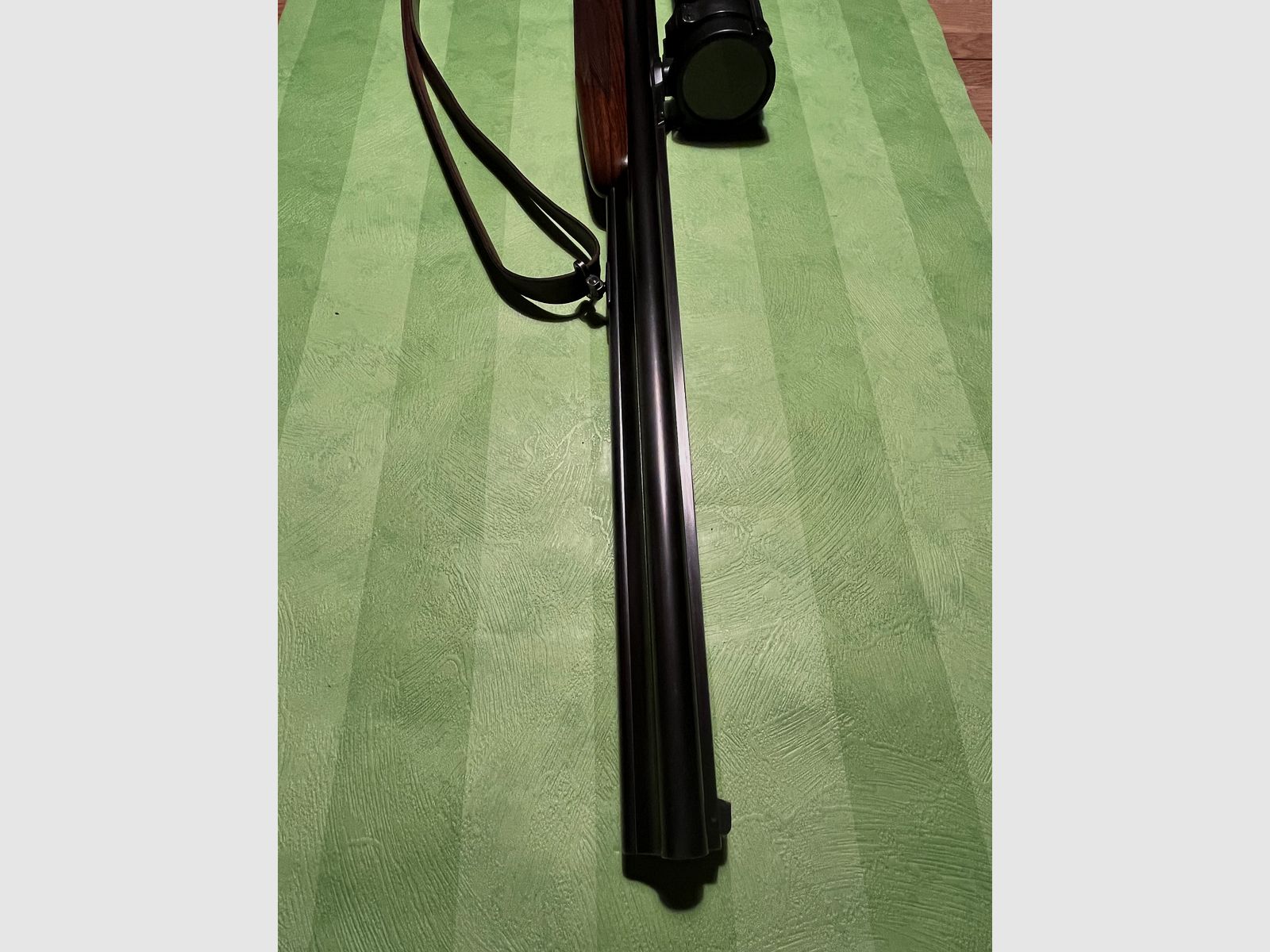 Krieghoff Plus Drilling mit 2 Schloss Handsp. im Kaliber 20/76,7x65R,.22 Hornet von vorne verstellbarer E Lauf, Zeiss HT 3-12x56 L.abs. 60 auf Schwenkmontage u. höhenverstellbare Schaftrücken