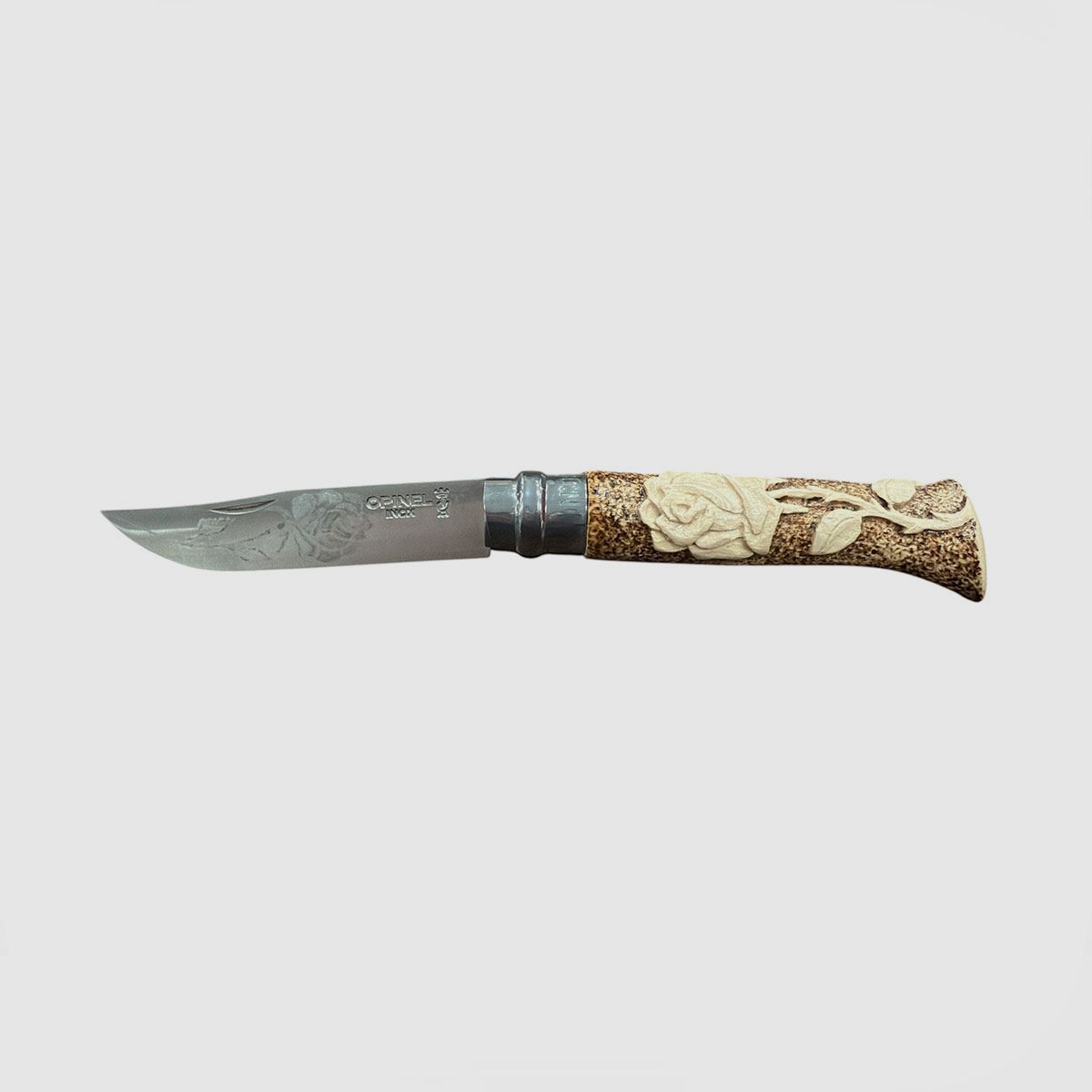 Couteau – OPINEL – N.8 INOX fabriqué à la main avec une rose sculptée, image 1 sur 2