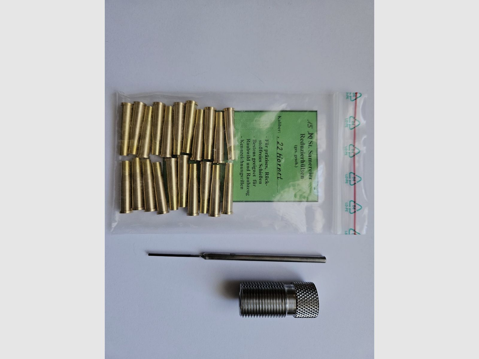 21 Samereier reducing cases .22 Hornet with die New and unused
