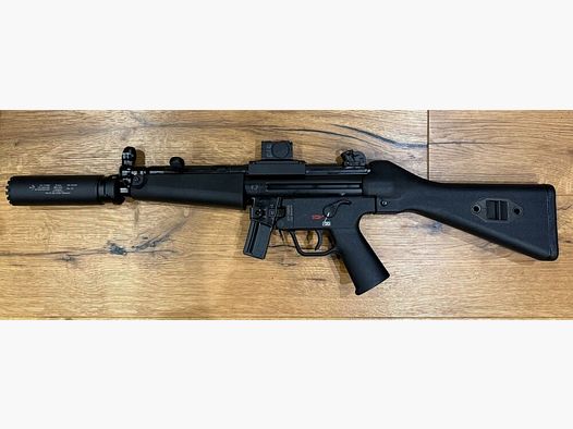 Rifle Heckler und Koch SP5 con silenciador B&T RBS SQD™ Compact y Aimpoint ACRO