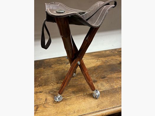 Taburete de tres patas