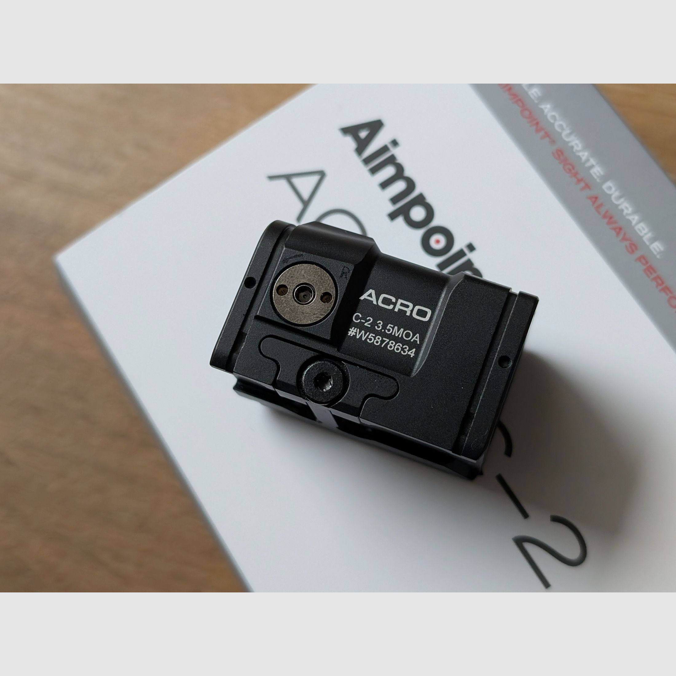 Two months old Aimpoint ACRO C-2 with receipt