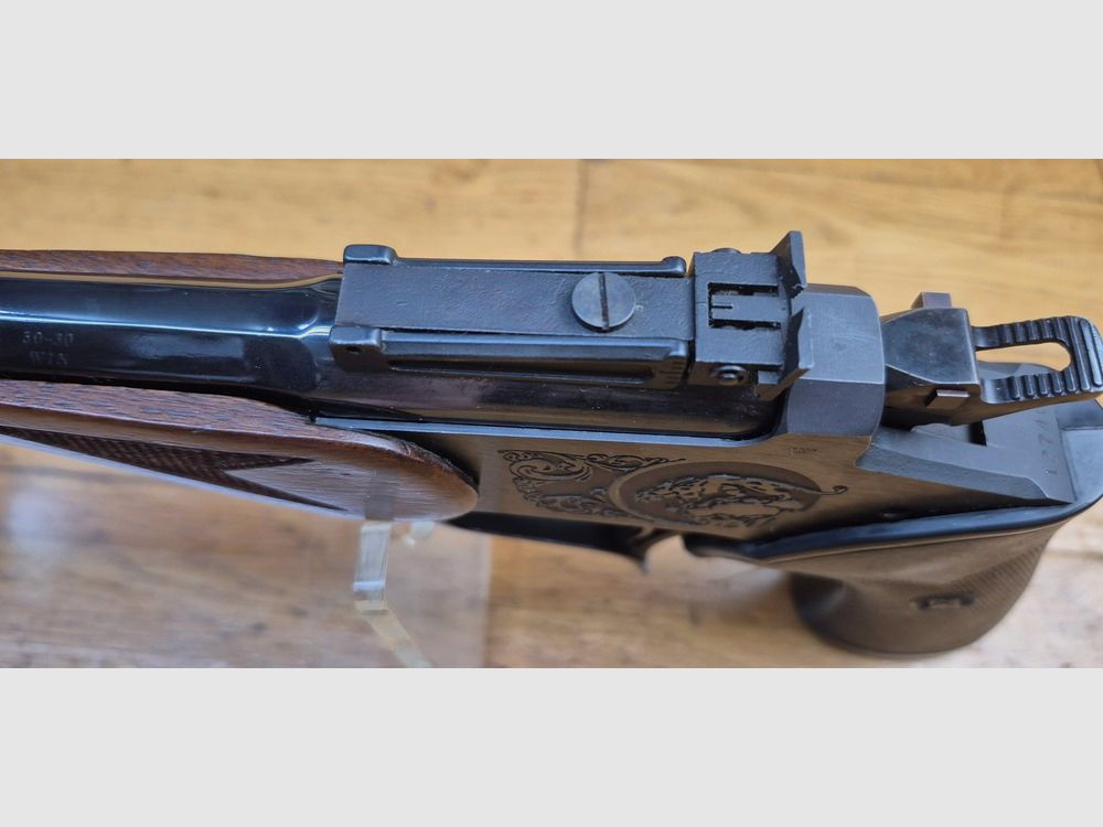 Zeer speelse Thompson Center Pistool – Model Contender – Loop van 10 inch – Kaliber 30-30 of 30WCF – Wapen van Rochester uit begin 1979 – Zeer mooi hout – Zeer goed aangepaste Pachmayr-greep – Prachtige octagonale loop – Uitstekende mechanica en trekker – Mooi trainings- en precisiewapen – TBE/TBE+, afbeelding 19 van 30