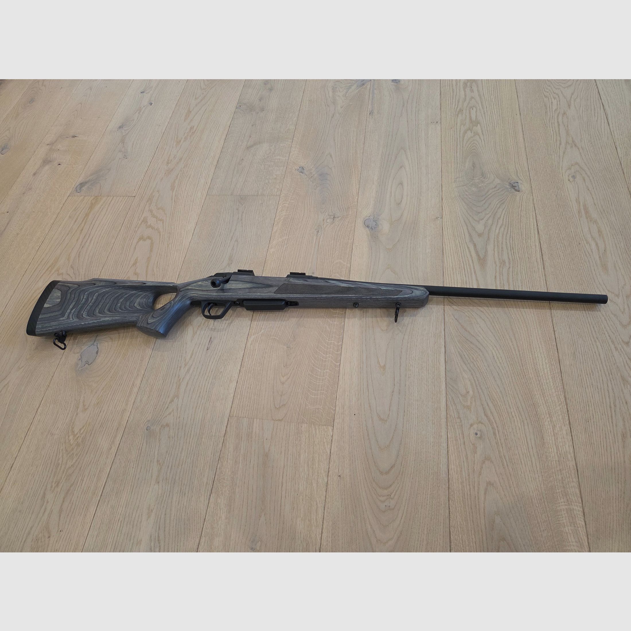 Winchester XPR repeating rifle in .308 with Steiner Ranger scope and silencer