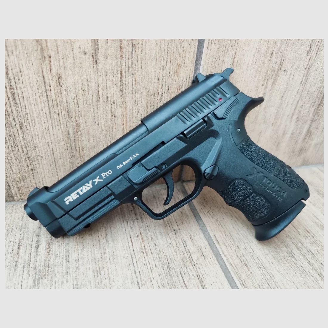 RETAY X Pro 9mm P.A.K. blank firing pistol in modern service pistol style