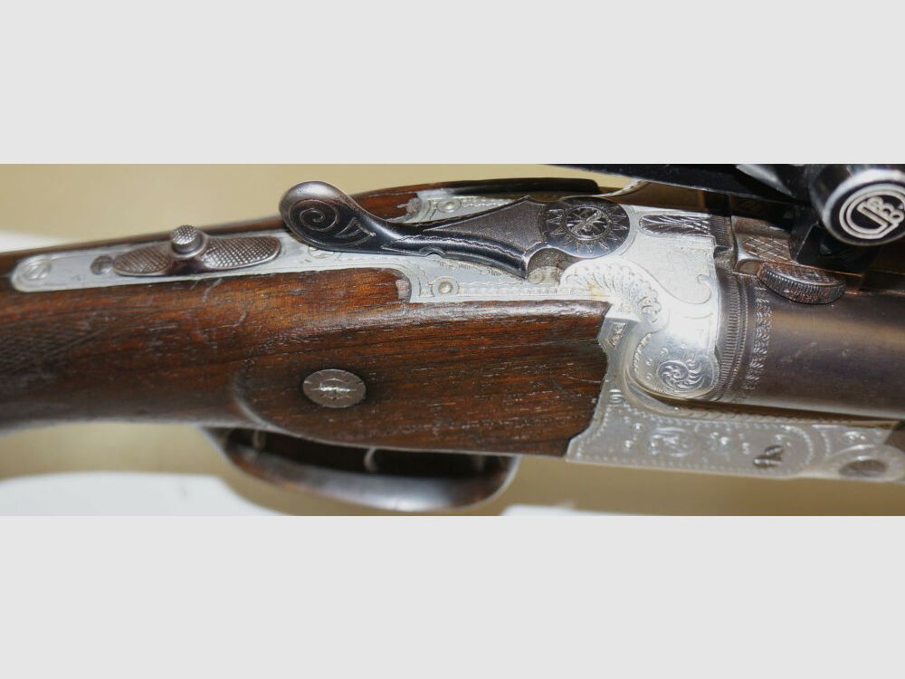 Krieghoff Drilling, Krieghoff, Kal.7x57R / Kal.16/70, mit GECO Zielfernrohr und schönen Gravuren